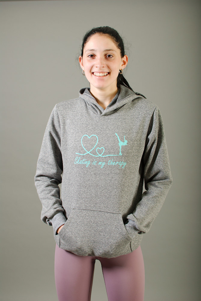 Coton ouaté style 'hoodie' avec capuchon et poche avant.  Design ''Skating is my theraphy''